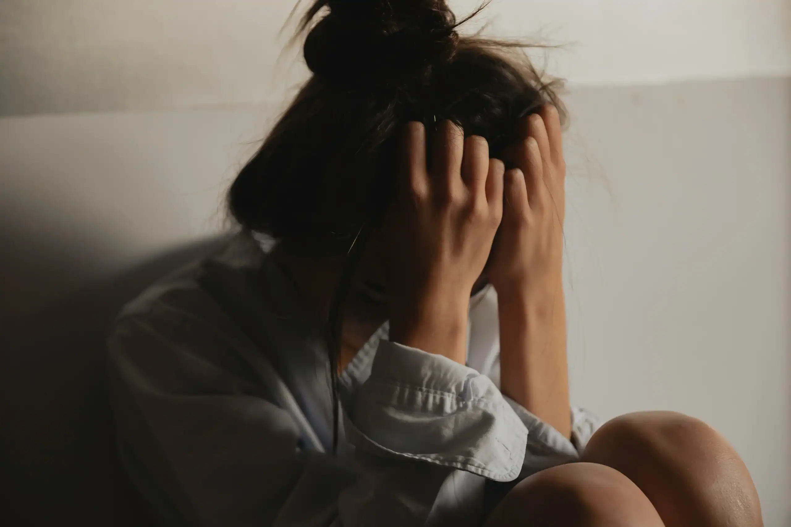 Overwhelmed woman coping with Alexithymia and Autism stress Overwhelmed woman coping with Alexithymia and Autism stress