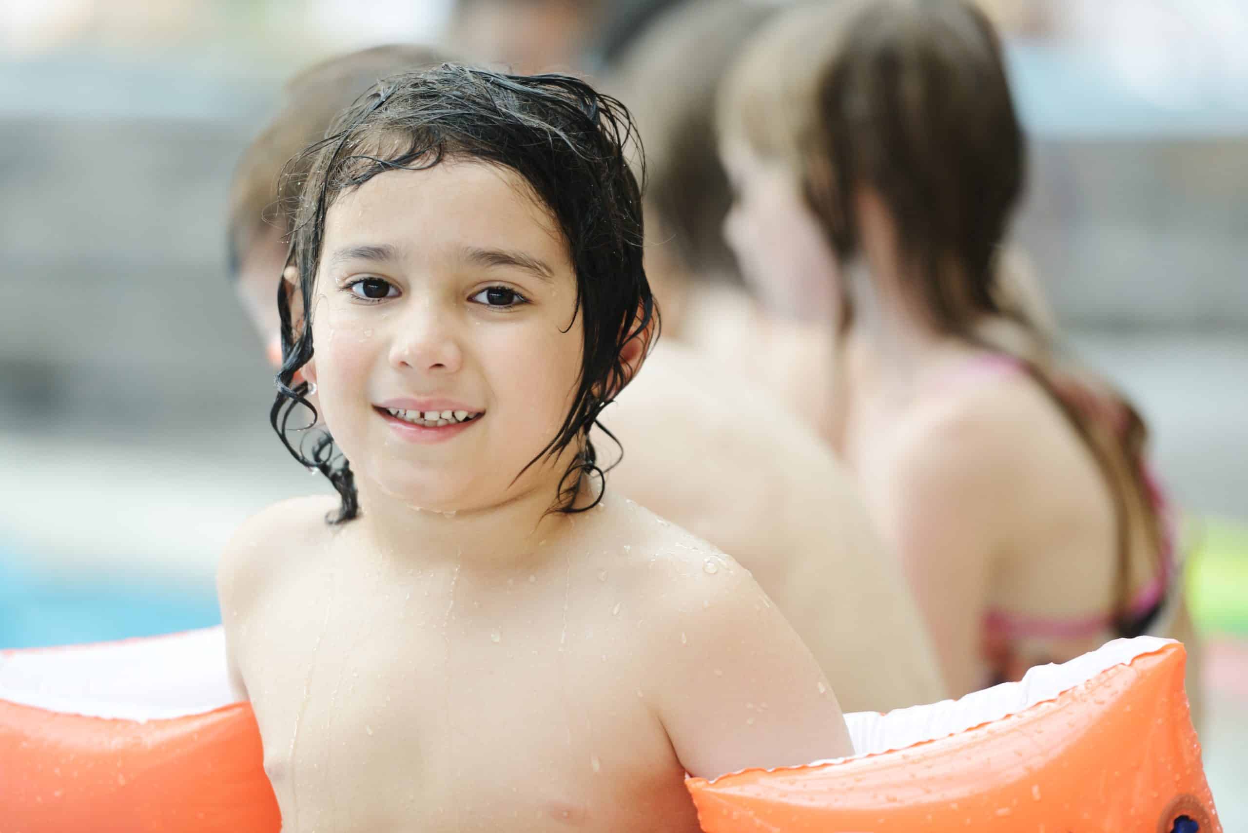 Summer happy time on pool ABC's of Water- Happy children on swimming pool