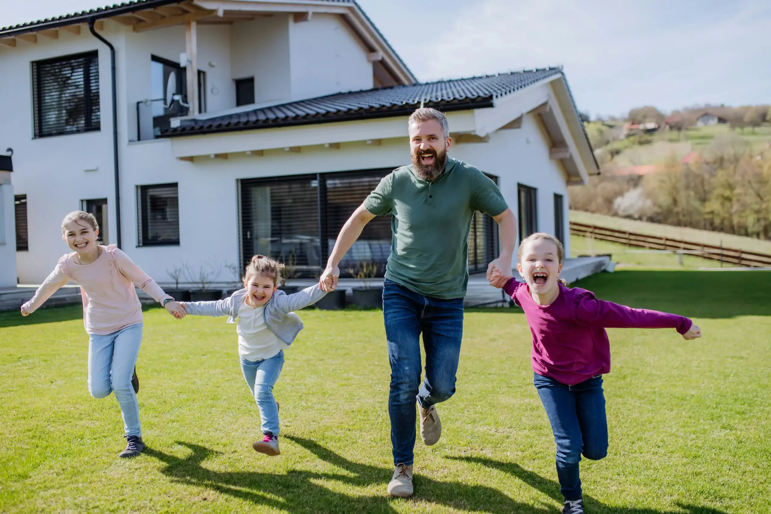 Father running outside with his children, celebrating progress after overcoming blended family challenges Father running outside with his children, celebrating progress after overcoming blended family challenges