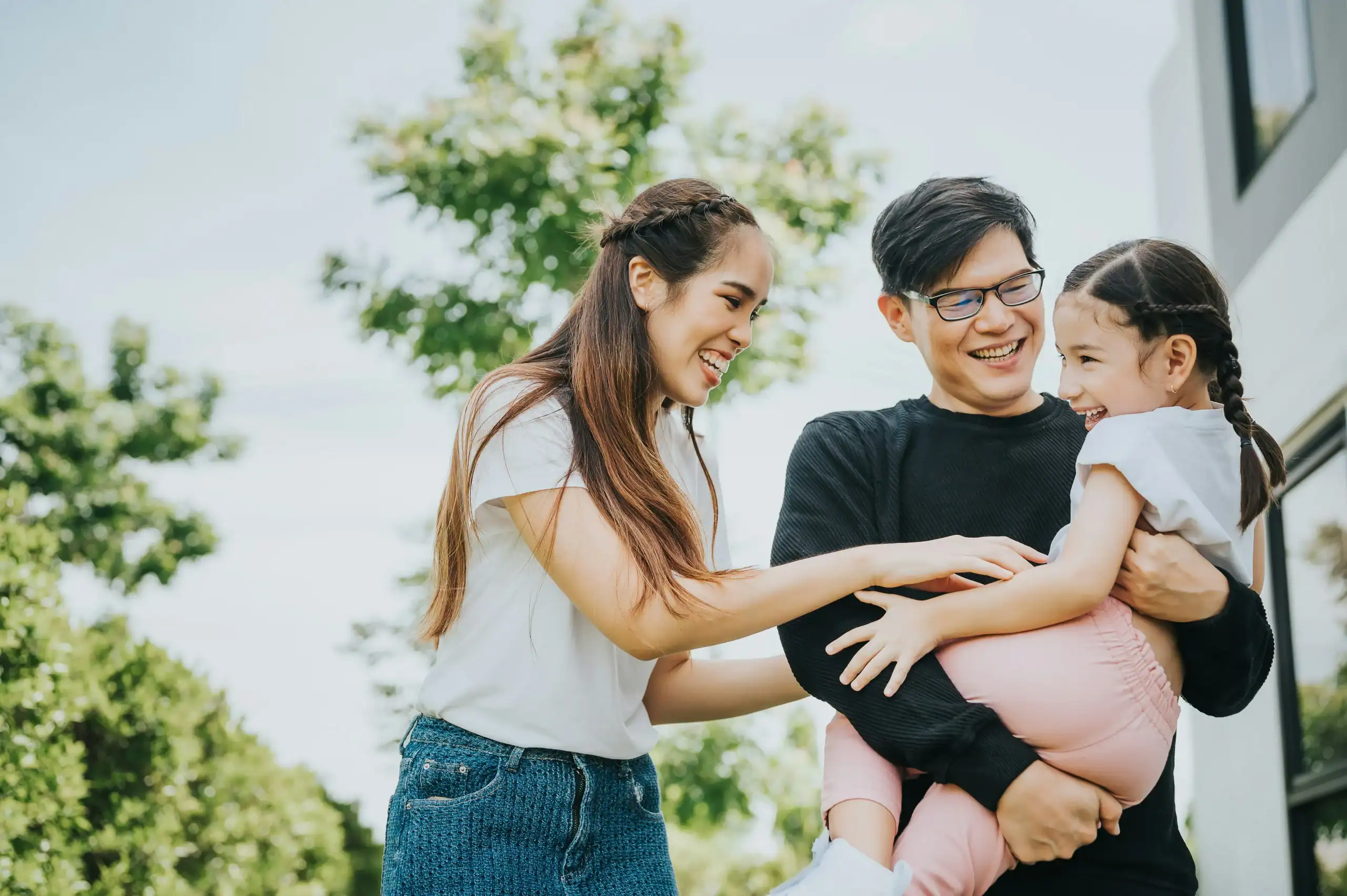 Parents enjoying time with child after learning about special needs trust spending rules