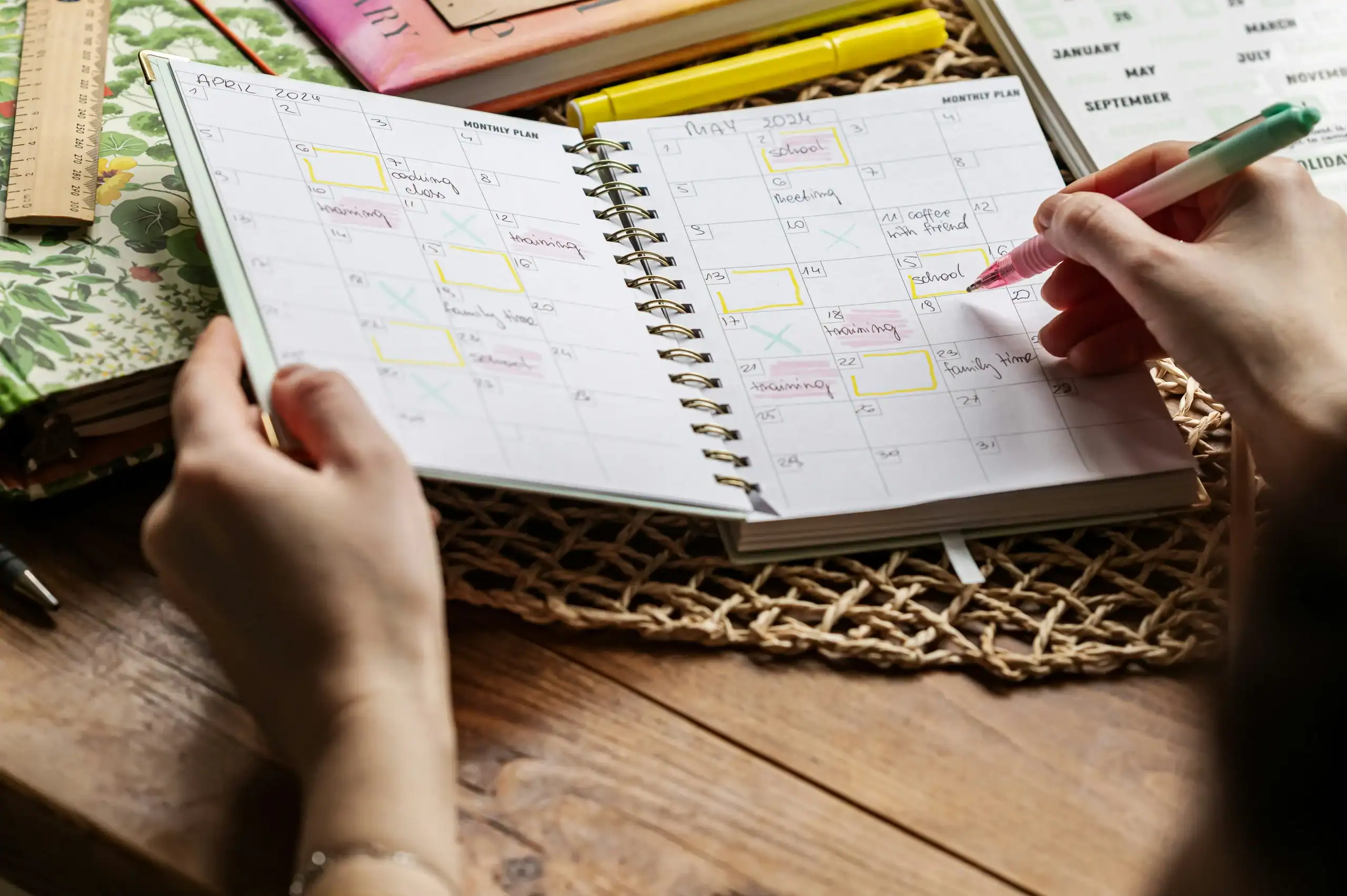 Open calendar with daily schedule, showing structured routines for potty training special needs children. Open calendar with daily schedule, showing structured routines for potty training special needs children.