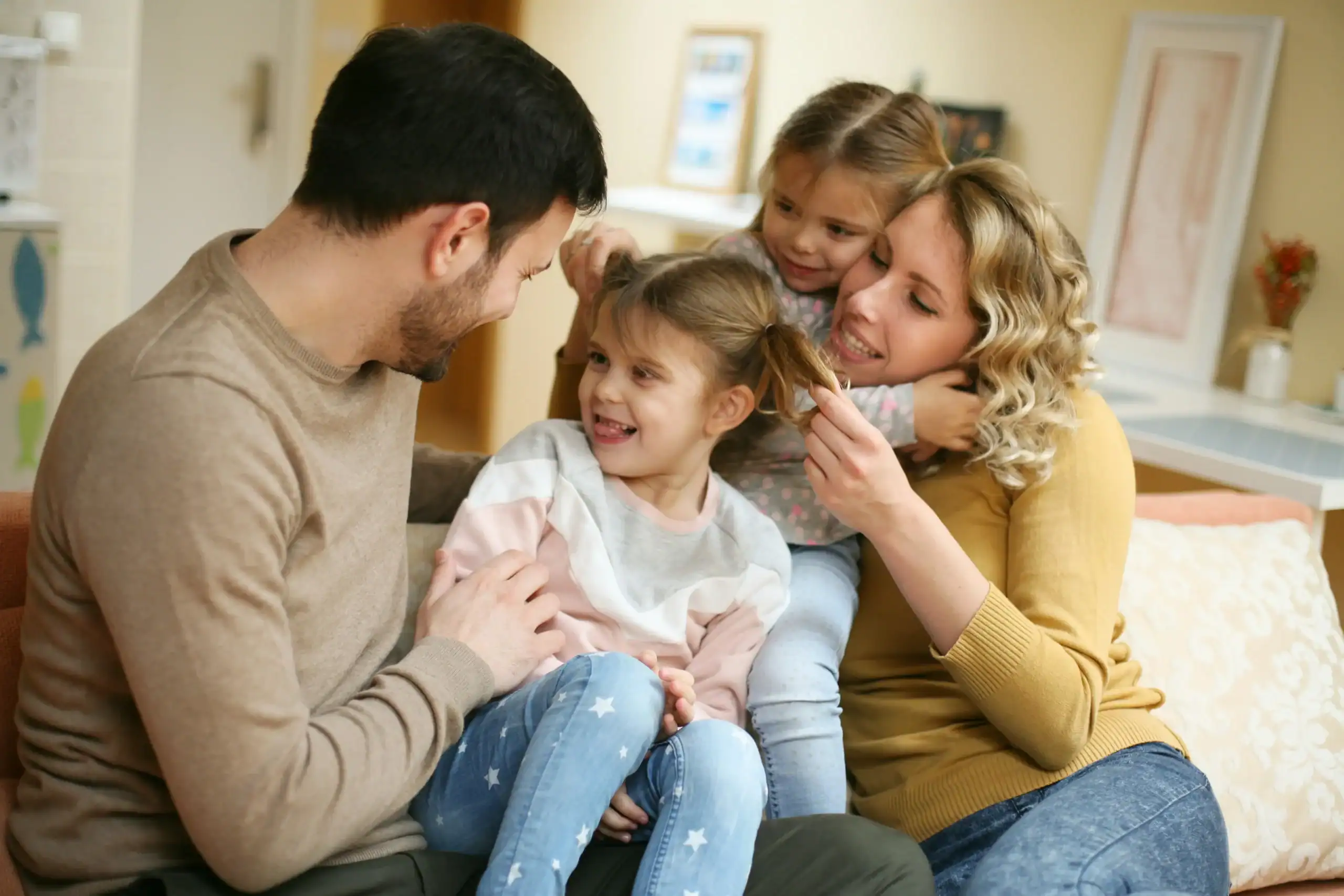 Happy family planning for their child’s future through special needs estate planning. Happy family planning for their child’s future through special needs estate planning.