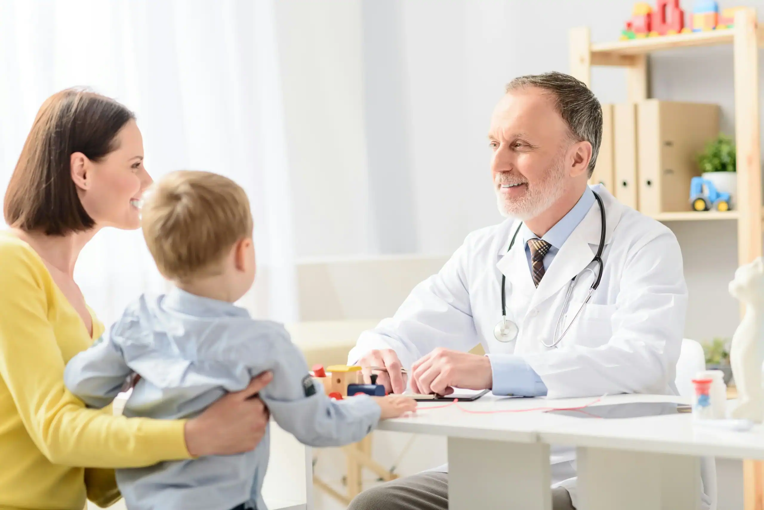 Parent asking questions to ask an ABA therapist while meeting with a healthcare provider. Parent asking questions to ask an ABA therapist while meeting with a healthcare provider.