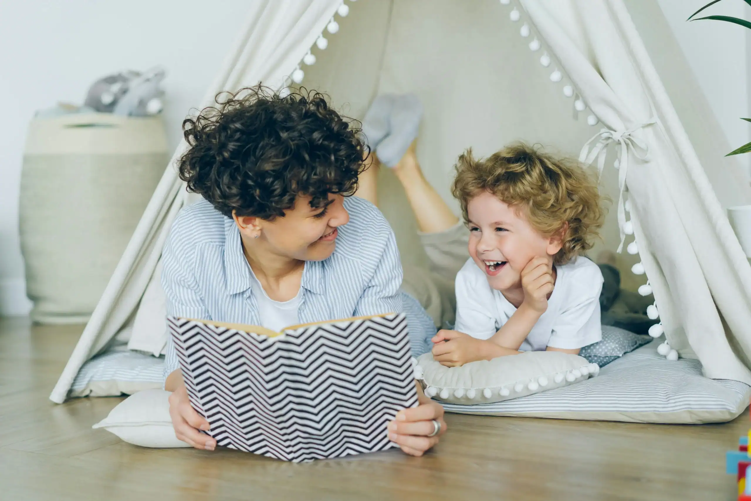Sibling reading with child to support early literacy and auditory dyslexia
