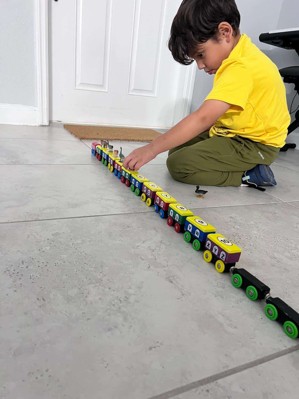 numbered wooden blocks in a row while playing